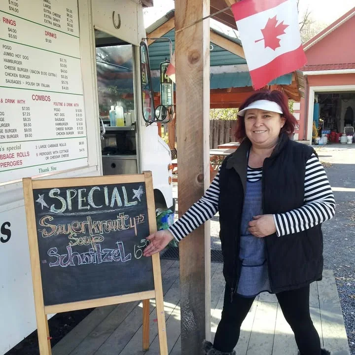 Eva's Chip Wagon truck, its menu board and the specials chalkboard